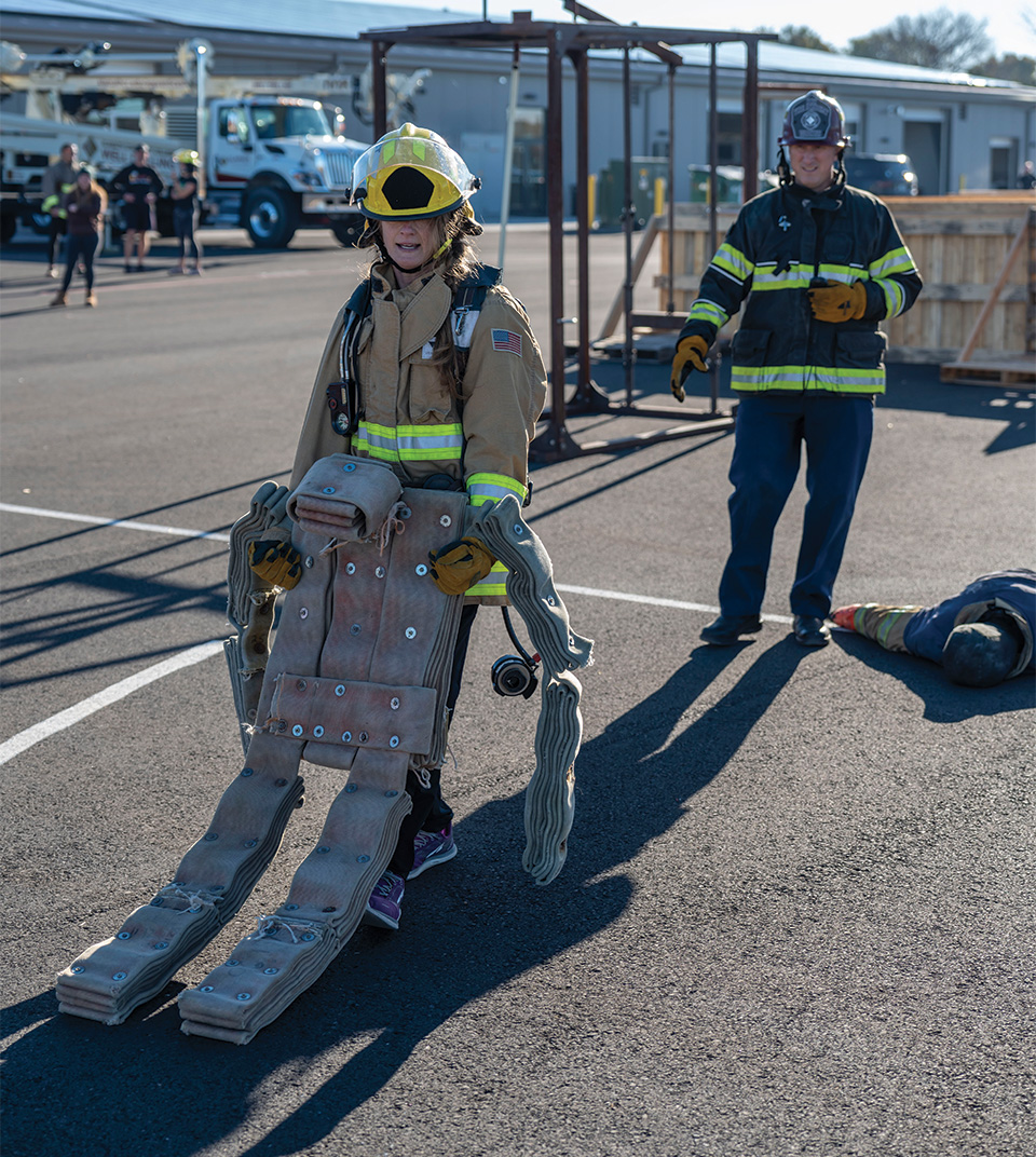 Hauling a makeshift body, comprising fire hoses, was one of the more difficult tests participants faced during the Movember strength tests held on the Klamath Community College campus Nov. 8. (Caleb Herrera/KCC photo)